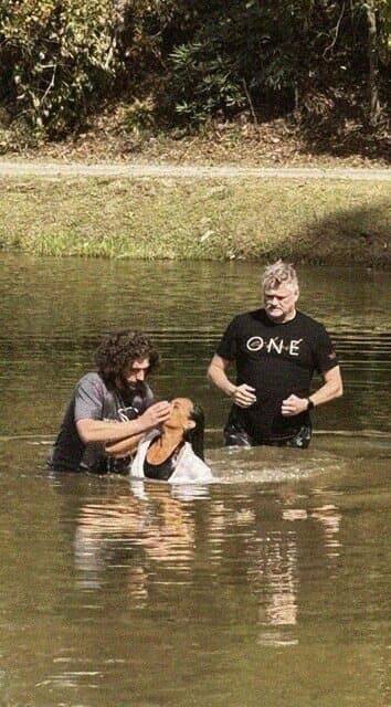 An outdoor baptism at Founded in Truth Fellowship