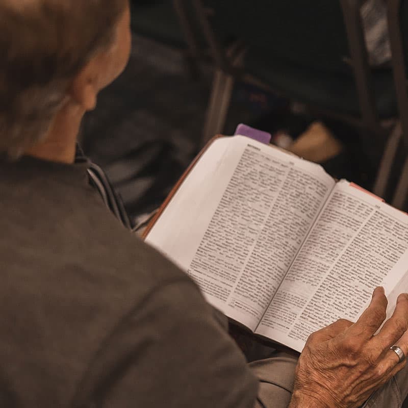 An open Bible during men's fellowship at Founded in Truth