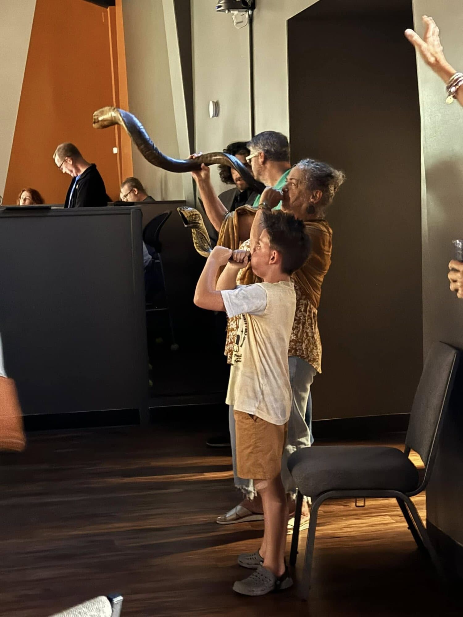 Generations worshiping together with shofars at Founded in Truth